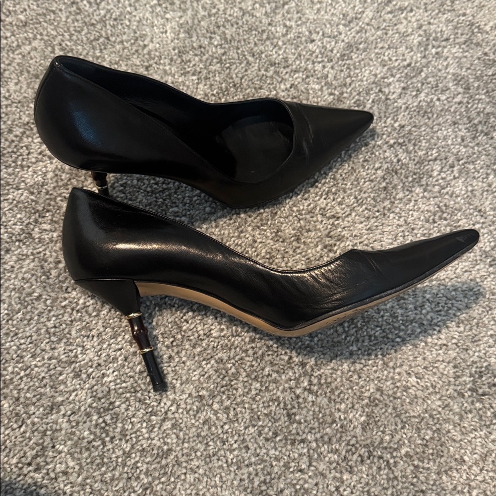 Black leather Gucci , bamboo heels sz8